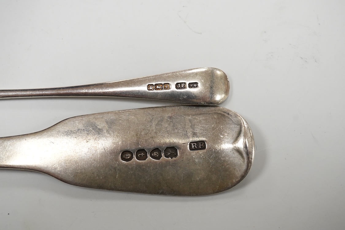 A William IV silver fiddle pattern table spoon by Richard Britton, London, 1834, together with a George V silver oval mustard pot, with blue glass liner, Edward Barnard Sons Ltd, London, 1931 and a silver coffee spoon.